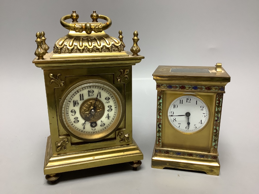 An early 20th century brass carriage timepiece and a champleve enamel timepiece, tallest 18cm